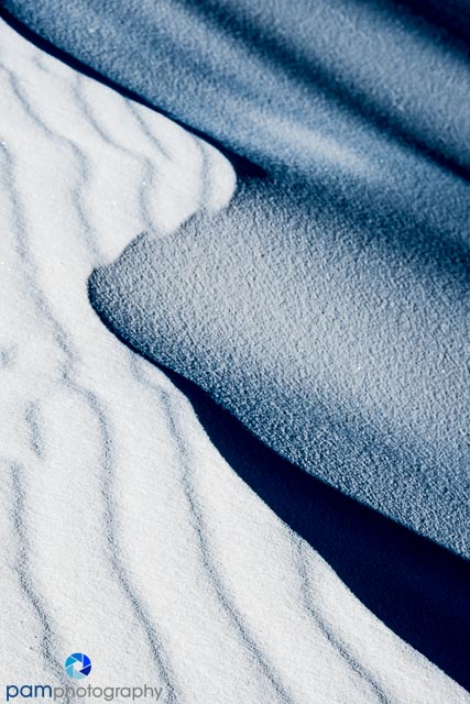 Abstraction of lines, curves, and shadows of the White Sands of New Mexico