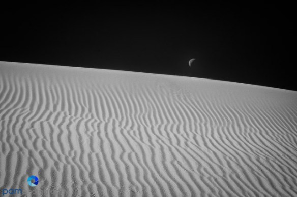Moon set over dune